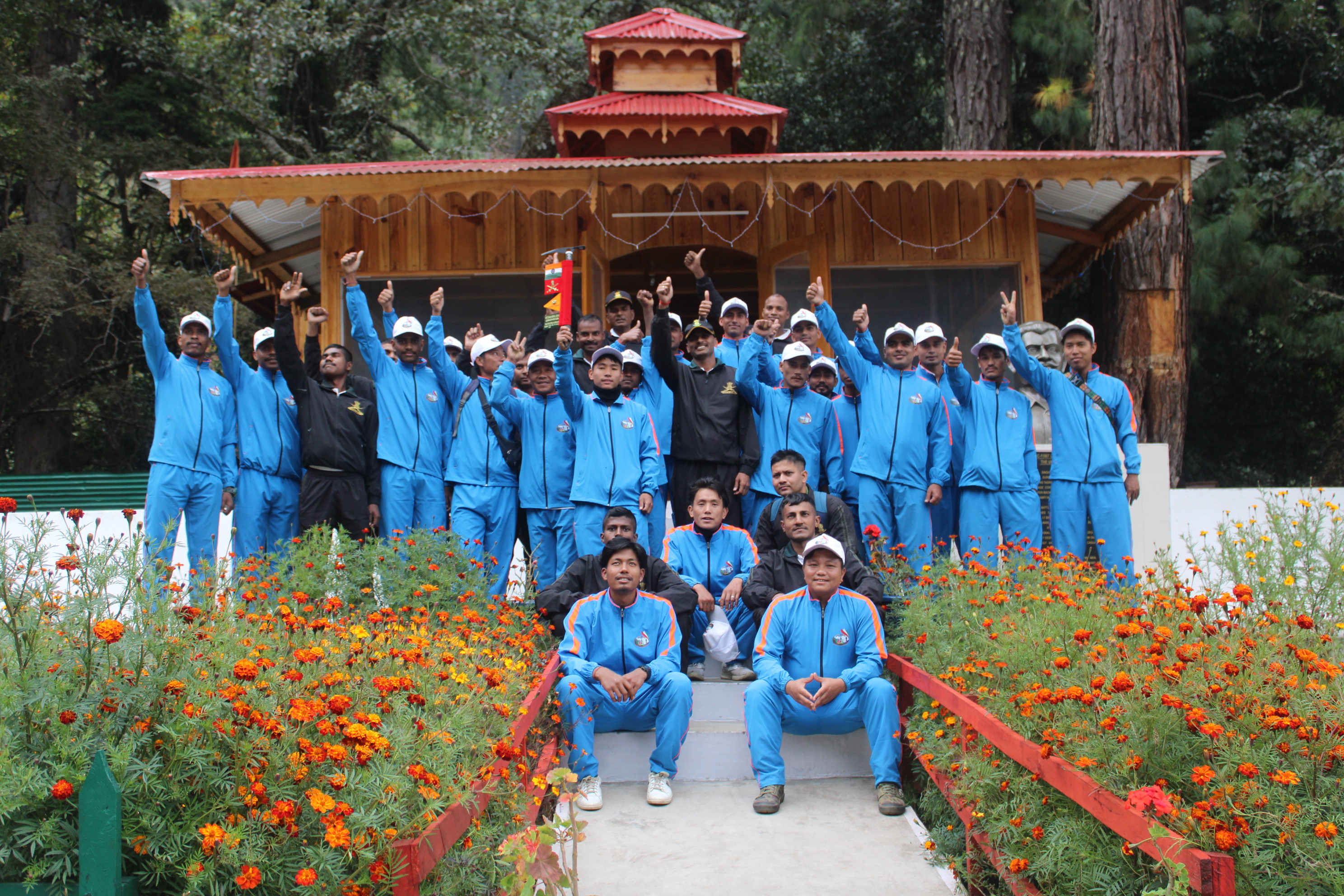 Group of trekkers at a war memorial in Walong, Arunachal Pradesh